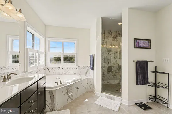 a view of roof deck with furniture and barbeque oven