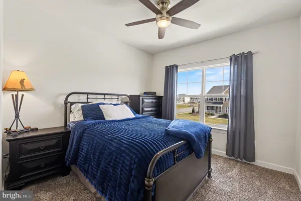 a view of a deck with chair and wooden floor