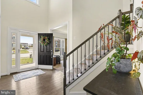 a kitchen with lots of counter top space and stainless steel appliances