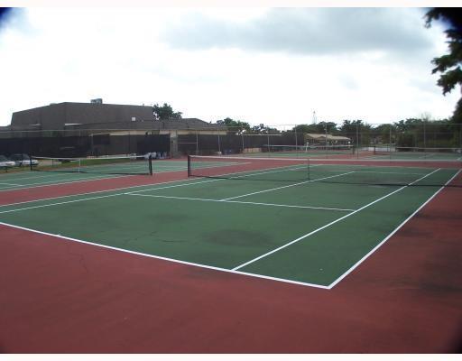 100 Berkley Road, Unit 105 Hollywood, FL 33024 - Photo 11 of 18 a view of a tennis court