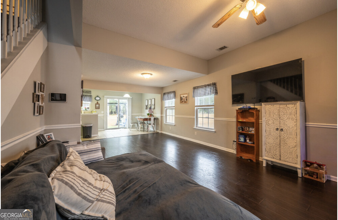 59 Laurel Way Ludowici, GA 31316 - Photo 12 of 21 a living room with furniture and a flat screen tv