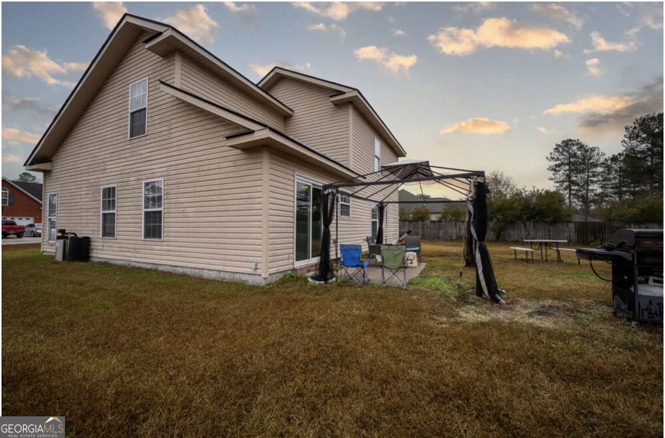 59 Laurel Way Ludowici, GA 31316 - Photo 17 of 21 a view of a house with backyard