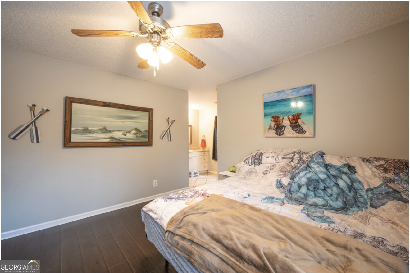 59 Laurel Way Ludowici, GA 31316 - Photo 5 of 21 a bedroom with bed and window