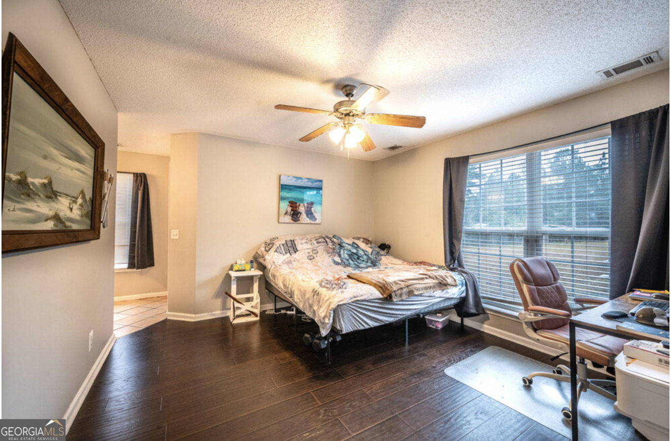 59 Laurel Way Ludowici, GA 31316 - Photo 6 of 21 a bedroom with bed and window