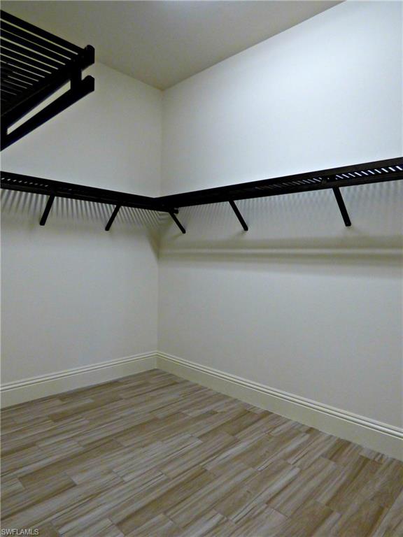 6376 Burnham Road Naples, FL 34119 - Photo 20 of 23 a view of an empty walk in closet