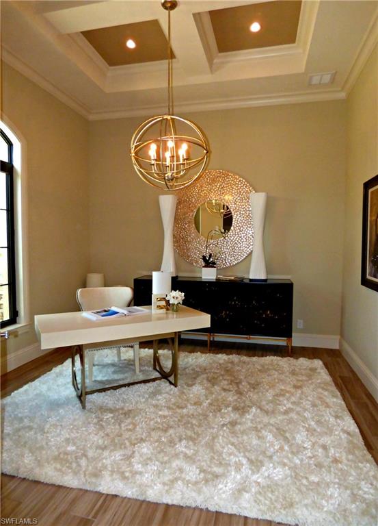 6376 Burnham Road Naples, FL 34119 - Photo 9 of 23 a view of a work space with furniture