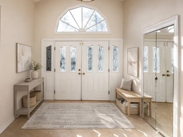 a bathroom with a tub sink shower and mirror
