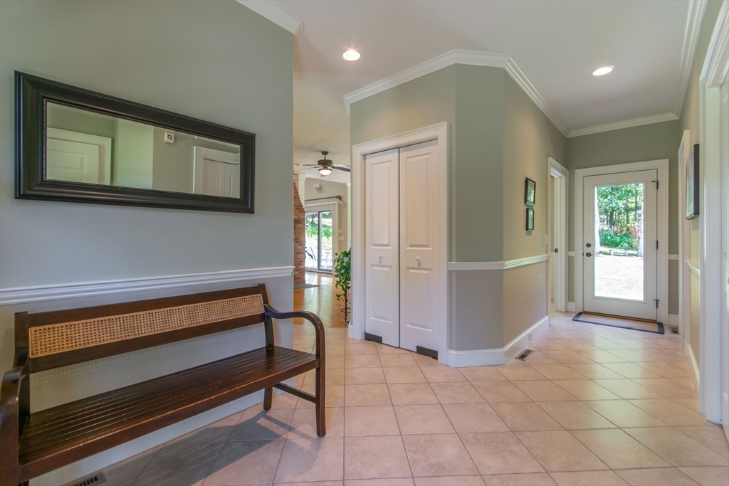 7 Western View Road Holyoke, MA 01040 - Photo 12 of 42 a view of front door and bedroom with furniture