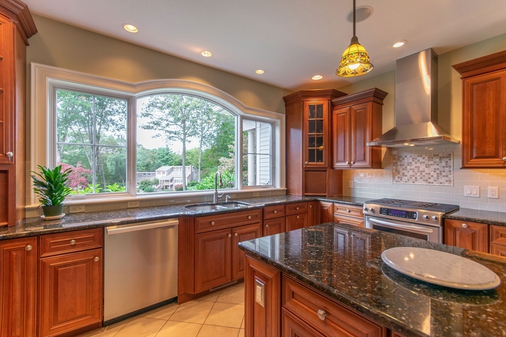 7 Western View Road Holyoke, MA 01040 - Photo 15 of 42 a kitchen with sink a window and chairs
