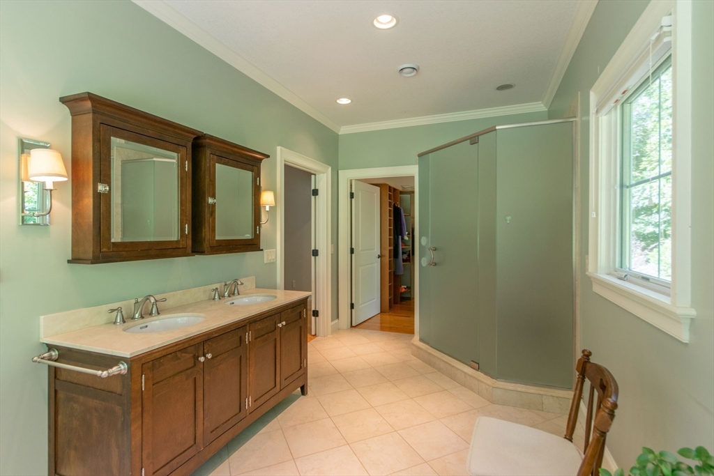 7 Western View Road Holyoke, MA 01040 - Photo 31 of 42 a bathroom with a double vanity sink mirror and shower