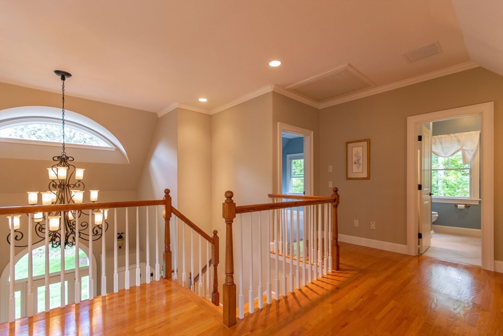 7 Western View Road Holyoke, MA 01040 - Photo 32 of 42 a view of a hallway with a chandelier