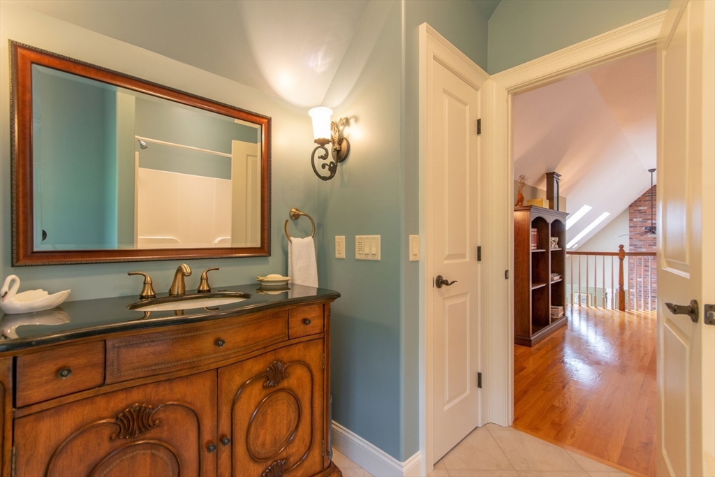 7 Western View Road Holyoke, MA 01040 - Photo 38 of 42 a bathroom with a sink vanity granite and a mirror