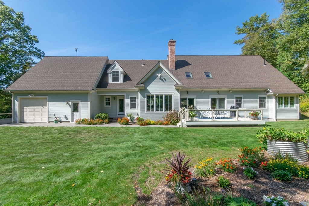 7 Western View Road Holyoke, MA 01040 - Photo 4 of 42 a front view of a house with swimming pool having outdoor seating
