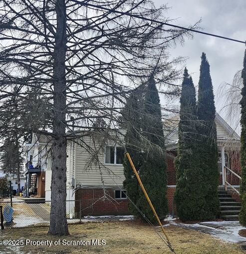805 Ferdinand Street Scranton, PA 18508 - Photo 3 of 15 a view of a house with a tree