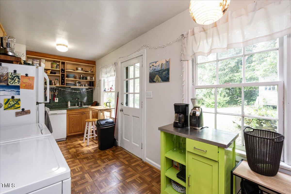 816 North King Charles Road Raleigh, NC 27610 - Photo 11 of 25 a living room with furniture and a window
