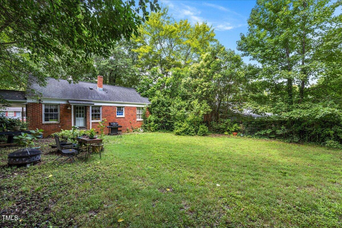 816 North King Charles Road Raleigh, NC 27610 - Photo 23 of 25 a front view of house with yard and green space