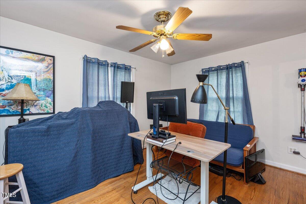 816 North King Charles Road Raleigh, NC 27610 - Photo 7 of 25 a workspace with furniture