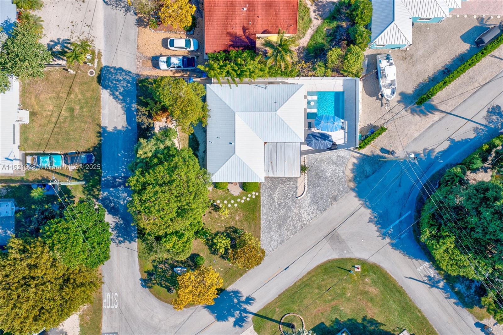 222 2nd Road Key Largo, FL 33037 - Photo 36 of 43 an aerial view of a house with a yard and a fountain