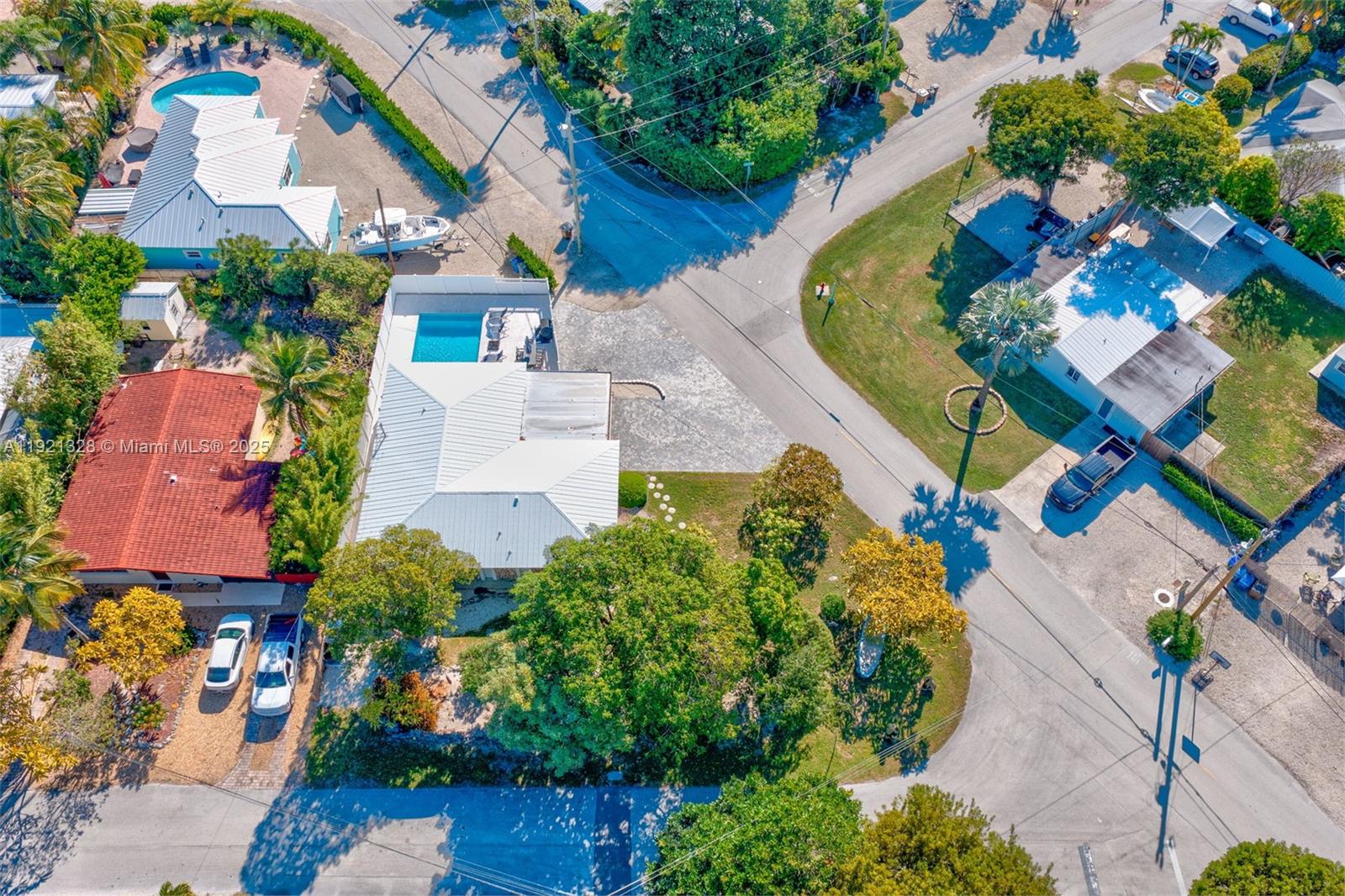 222 2nd Road Key Largo, FL 33037 - Photo 38 of 43 an aerial view of a house with a swimming pool