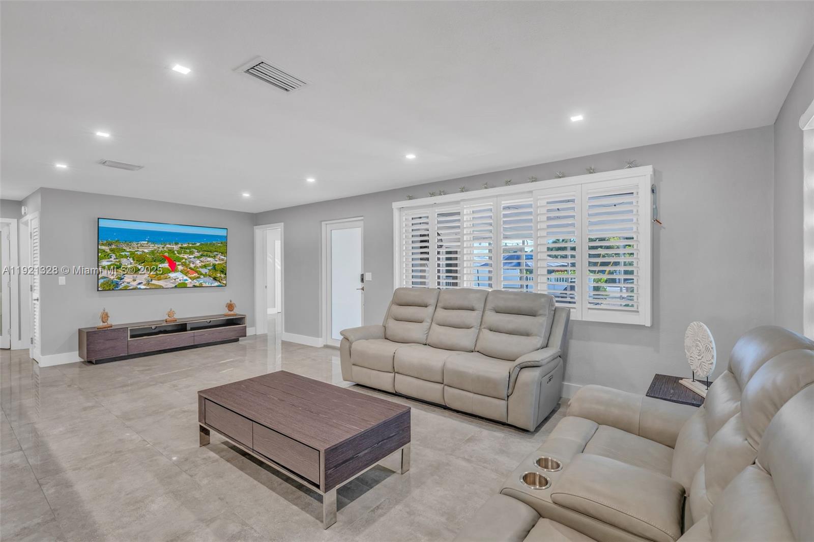 222 2nd Road Key Largo, FL 33037 - Photo 5 of 43 a living room with furniture and a flat screen tv