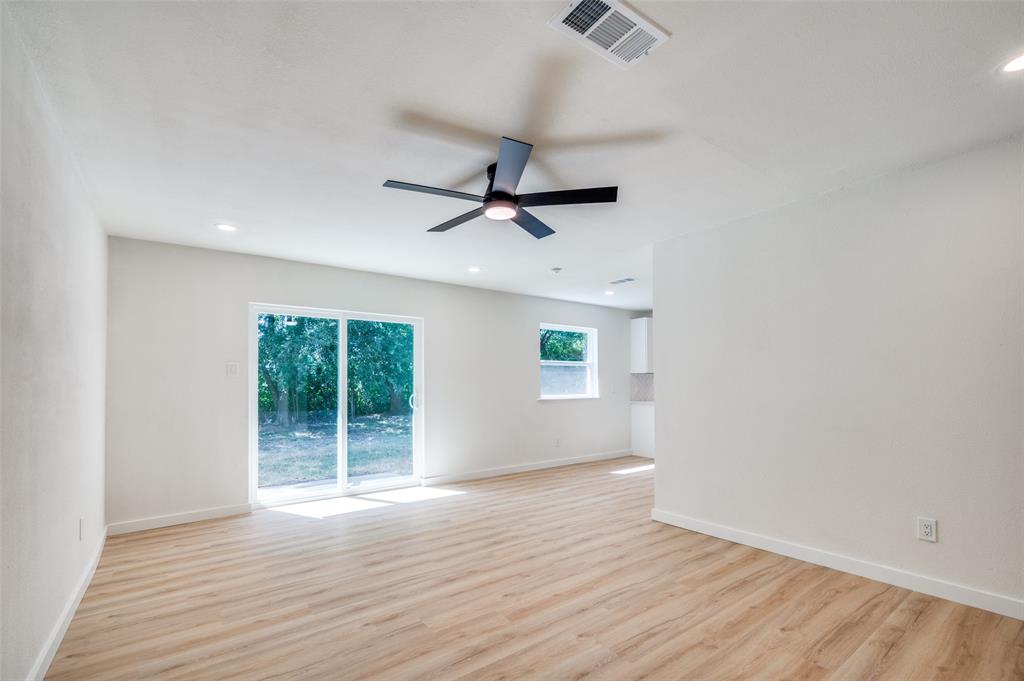 509 Steeple Ridge Court Everman, TX 76140 - Photo 15 of 21 Spare room with recessed lighting, a ceiling fan, and light wood-type flooring