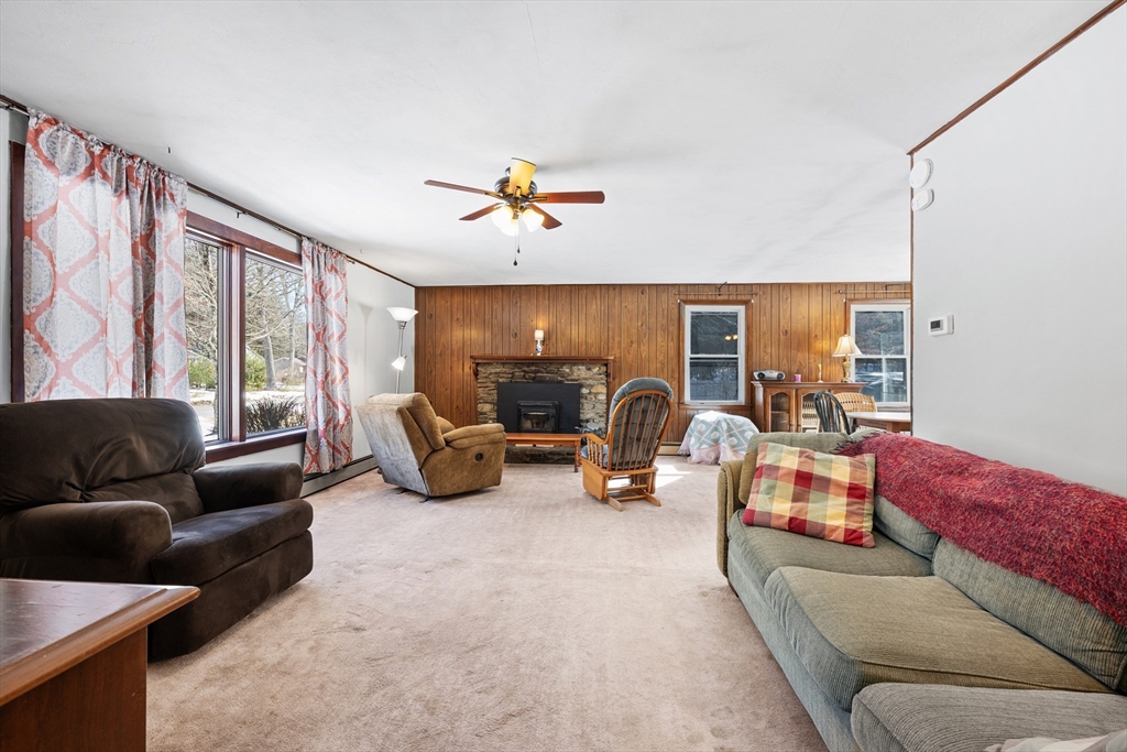 76 Beaver Lake Road Ware, MA 01082 - Photo 12 of 23 a living room with furniture gym equipment and a large window