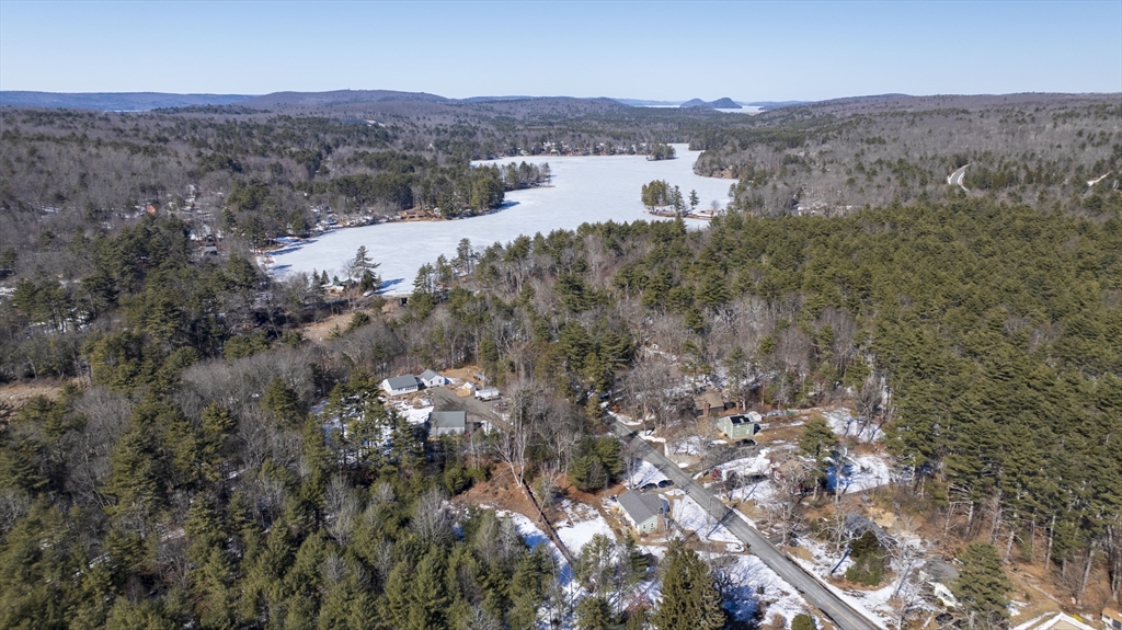 76 Beaver Lake Road Ware, MA 01082 - Photo 23 of 23 an aerial view of mountain with residential house and green space
