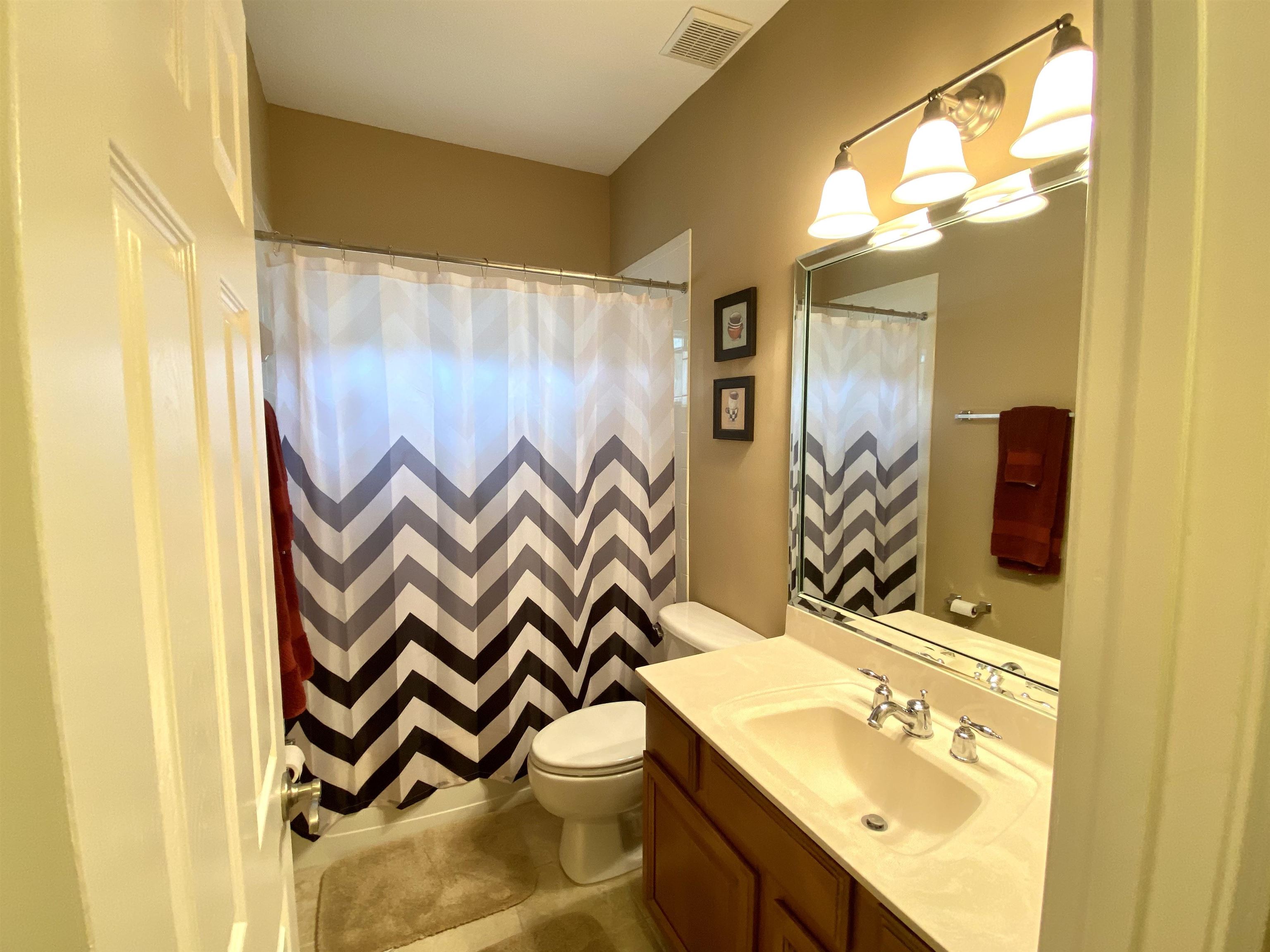 3844 Paddington Place St. Augustine, FL 32092 - Photo 14 of 40 a bathroom with a sink and a mirror