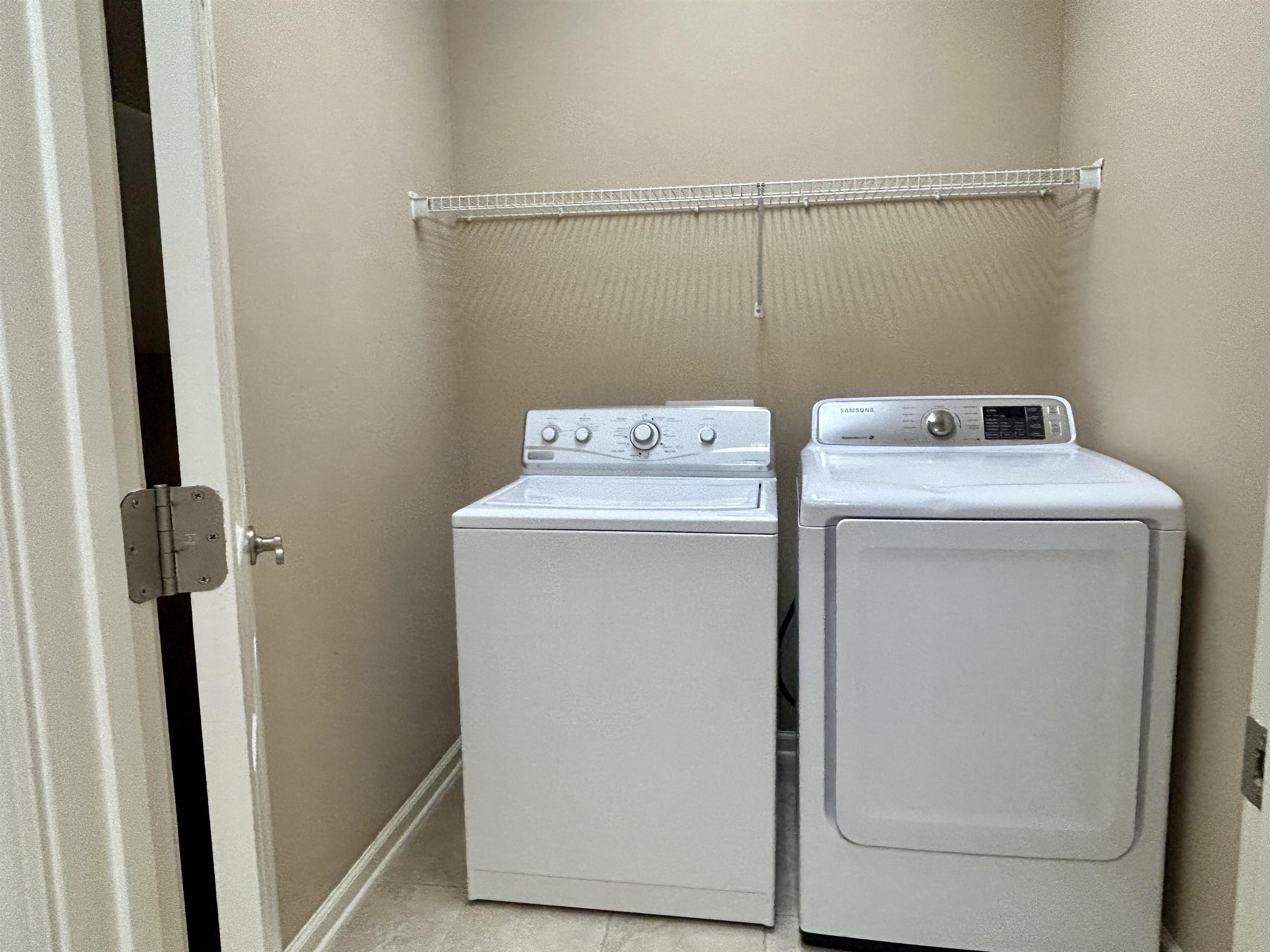 3844 Paddington Place St. Augustine, FL 32092 - Photo 15 of 40 a utility room with dryer and washer