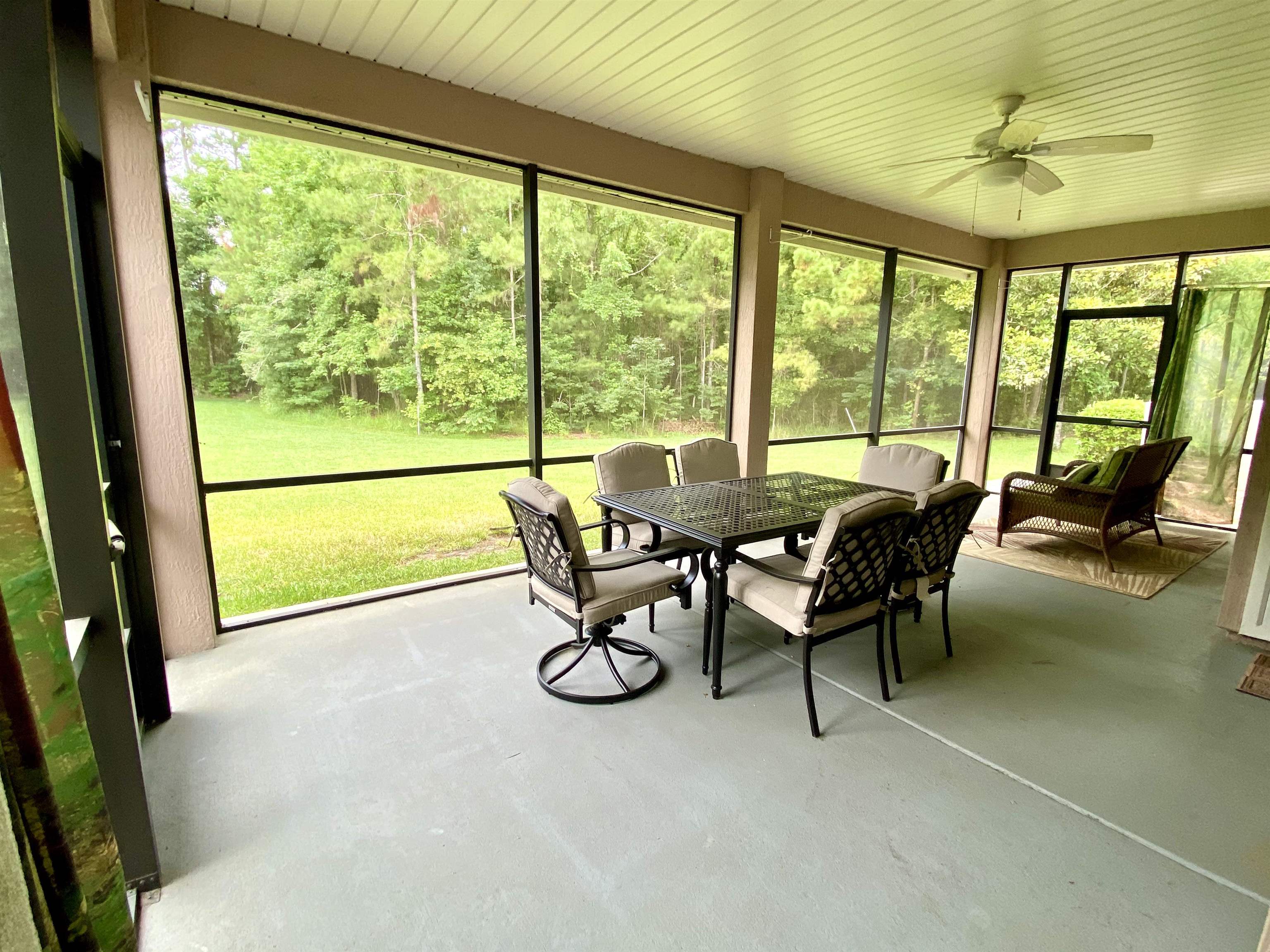 3844 Paddington Place St. Augustine, FL 32092 - Photo 16 of 40 a view of a dining room with furniture window and outside view