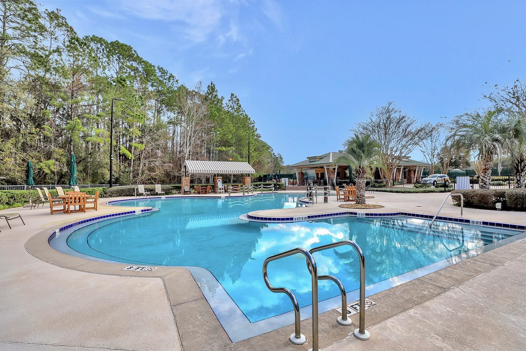 3844 Paddington Place St. Augustine, FL 32092 - Photo 22 of 40 a swimming pool with outdoor seating and yard