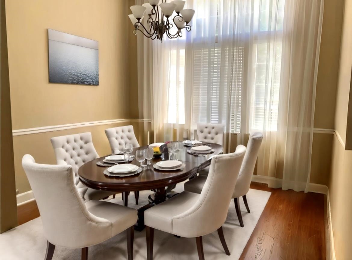 3844 Paddington Place St. Augustine, FL 32092 - Photo 5 of 40 a view of a dining room with furniture and wooden floor