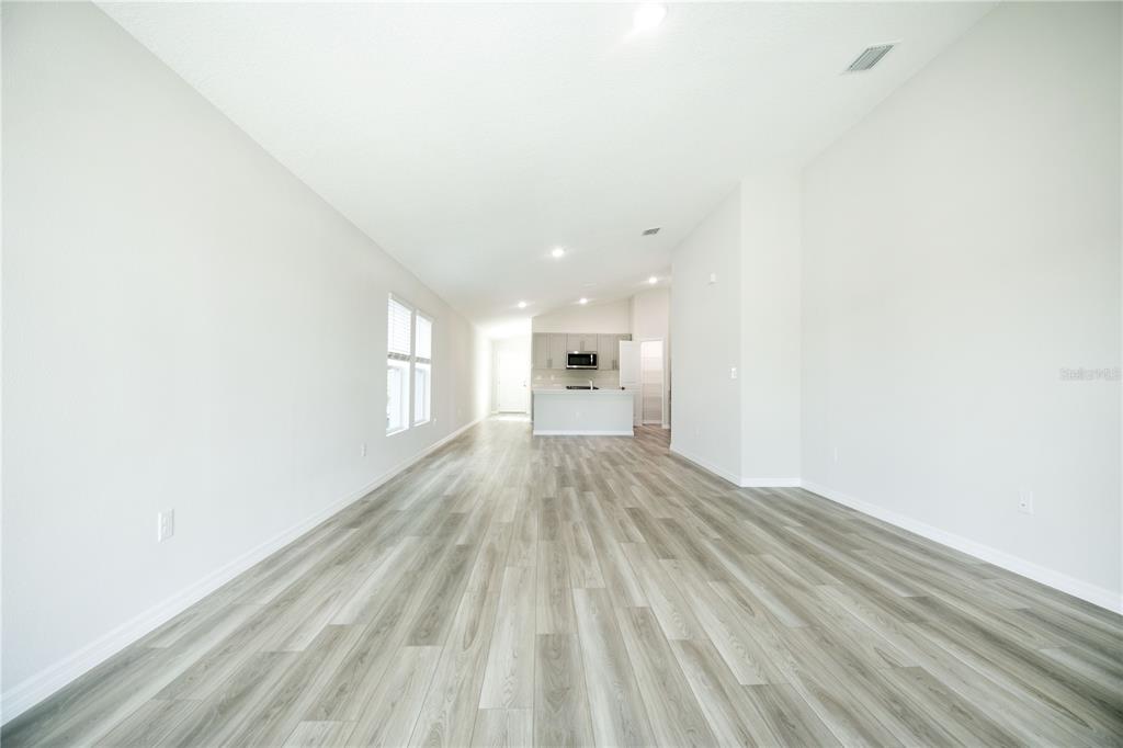 37056 Sagemoor Drive Zephyrhills, FL 33540 - Photo 15 of 21 a view of empty room with wooden floor