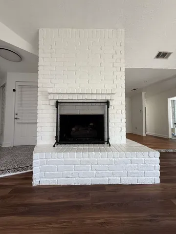 a living room with a fireplace