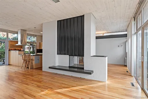 a bed room with a bed and a window