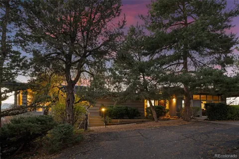a view of a backyard of the house