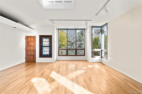 a big room with an outdoor view