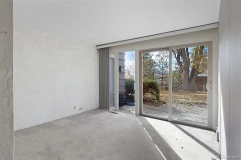 a view of balcony with wooden floor