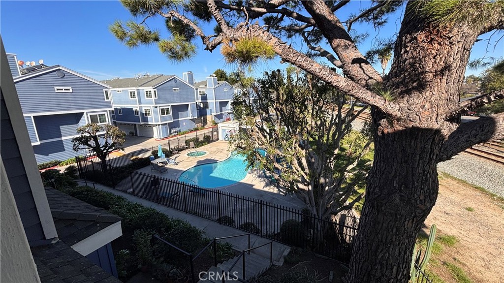 103 West Spring Street, Unit A Long Beach, CA 90806 - Photo 19 of 27 a view of a house with a tree