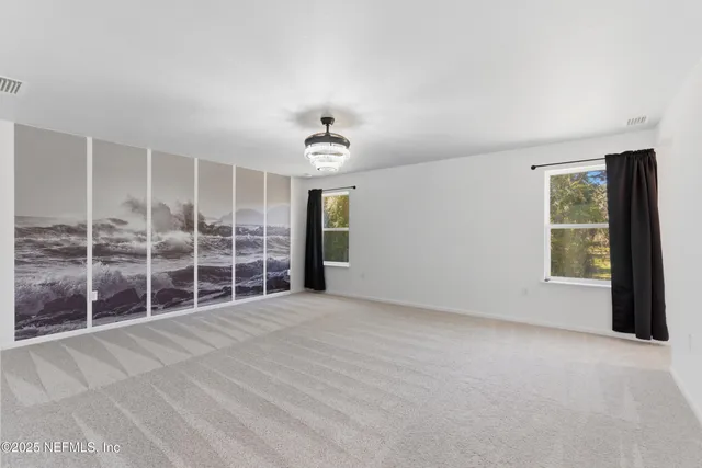 a bathroom with a tub and shower