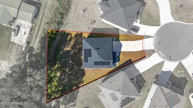 a bathroom with a granite countertop sink and bathtub