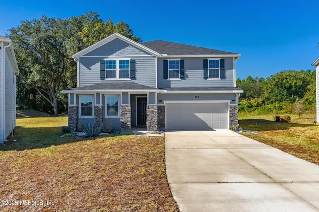 a front view of a house with swimming pool