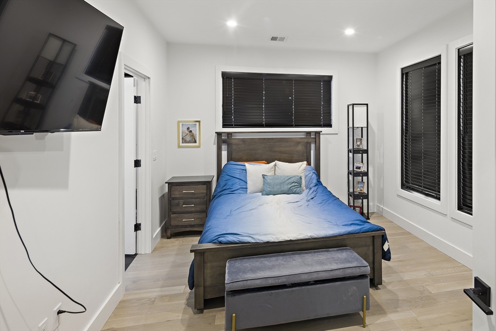68 Armandine Street, Unit 3 Boston, MA 02124 - Photo 8 of 23 a view of kitchen with furniture and wooden floor
