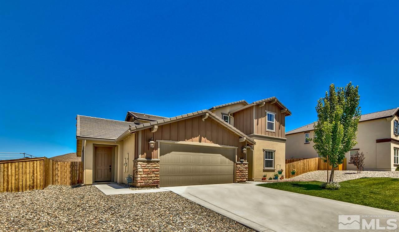 2985 Bull Rider Drive Reno, NV 89521 - Photo 1 of 16 a front view of a house with a yard