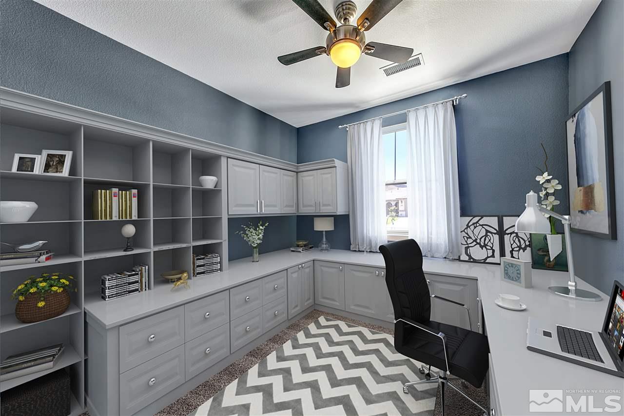 2985 Bull Rider Drive Reno, NV 89521 - Photo 6 of 16 a kitchen with a breakfast area