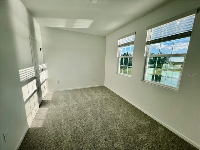 a view of backyard of a house