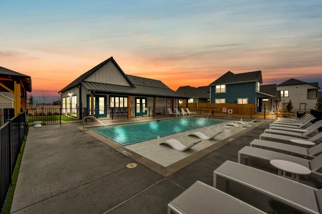 a backyard of a house with seating space