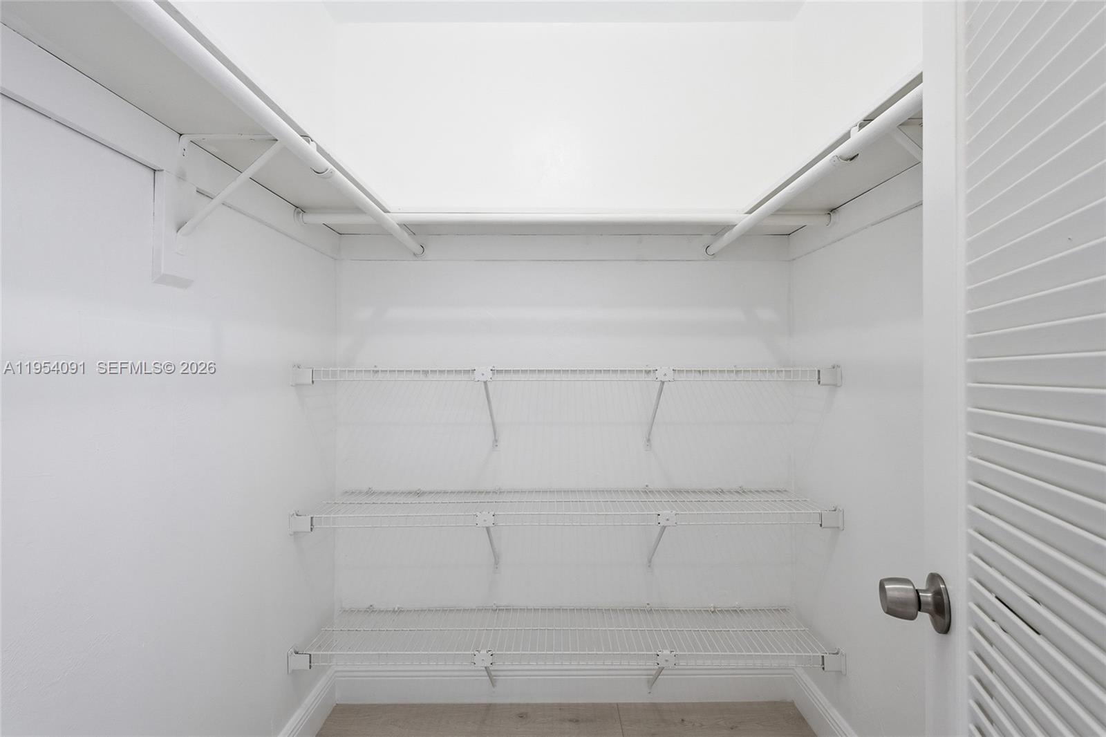 1345 Lincoln Road, Unit 1006 Miami Beach, FL 33139 - Photo 14 of 27 a view of walk in closet