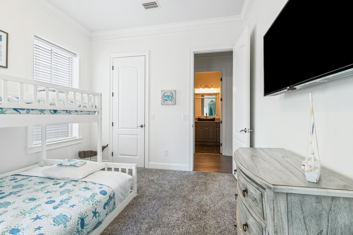 337 Grande Pointe Circle Inlet Beach, FL 32461 - Photo 13 of 73 a bedroom with a bed and chandelier