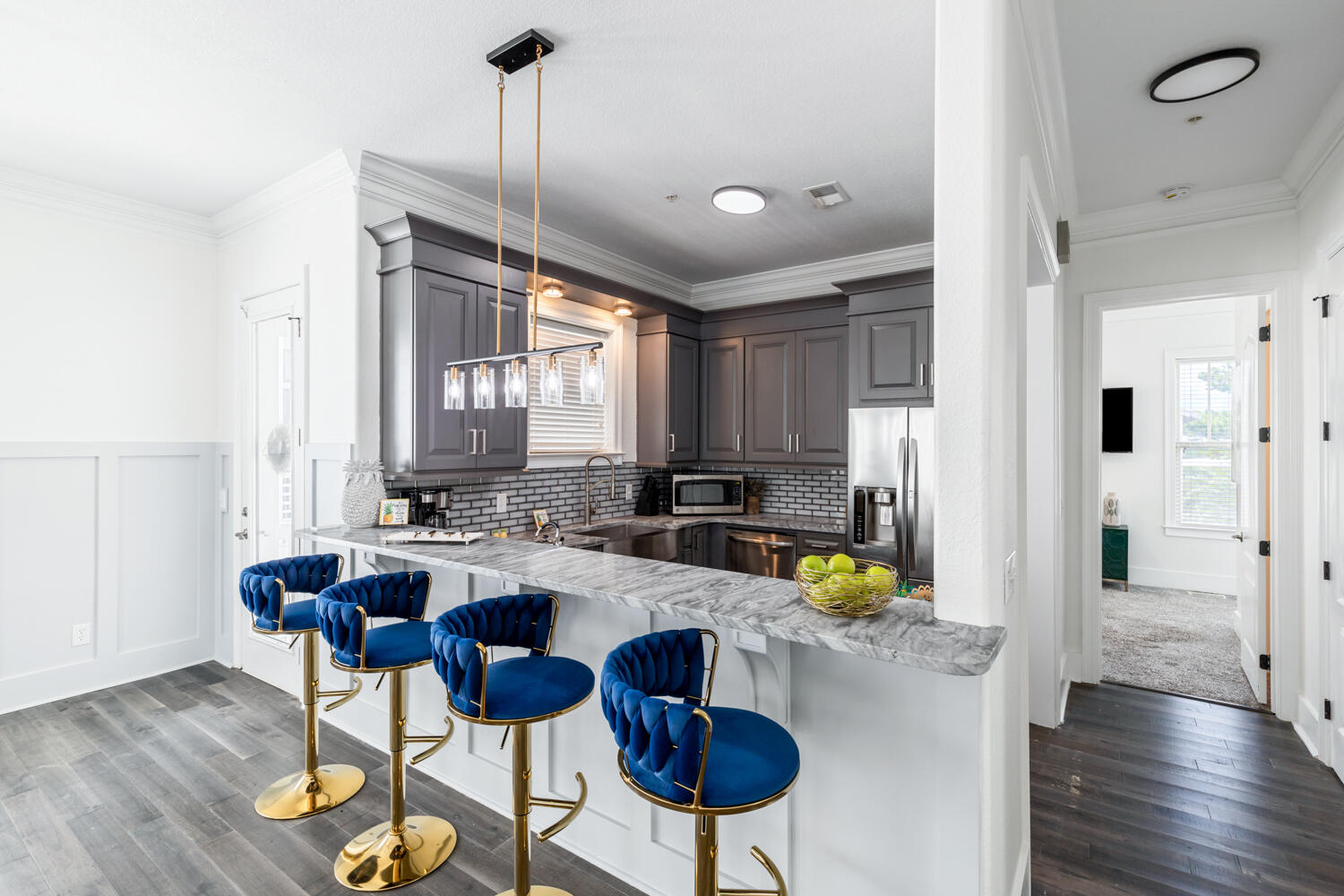 337 Grande Pointe Circle Inlet Beach, FL 32461 - Photo 26 of 73 a view of a dining room with furniture a chandelier and wooden floor